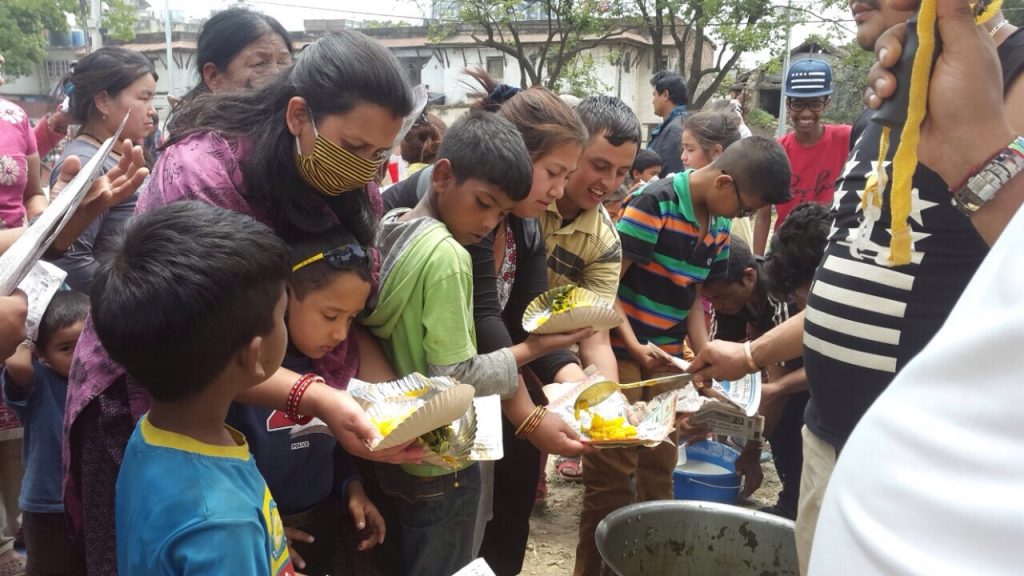 Feeding of Kids after Nepal Earth quake